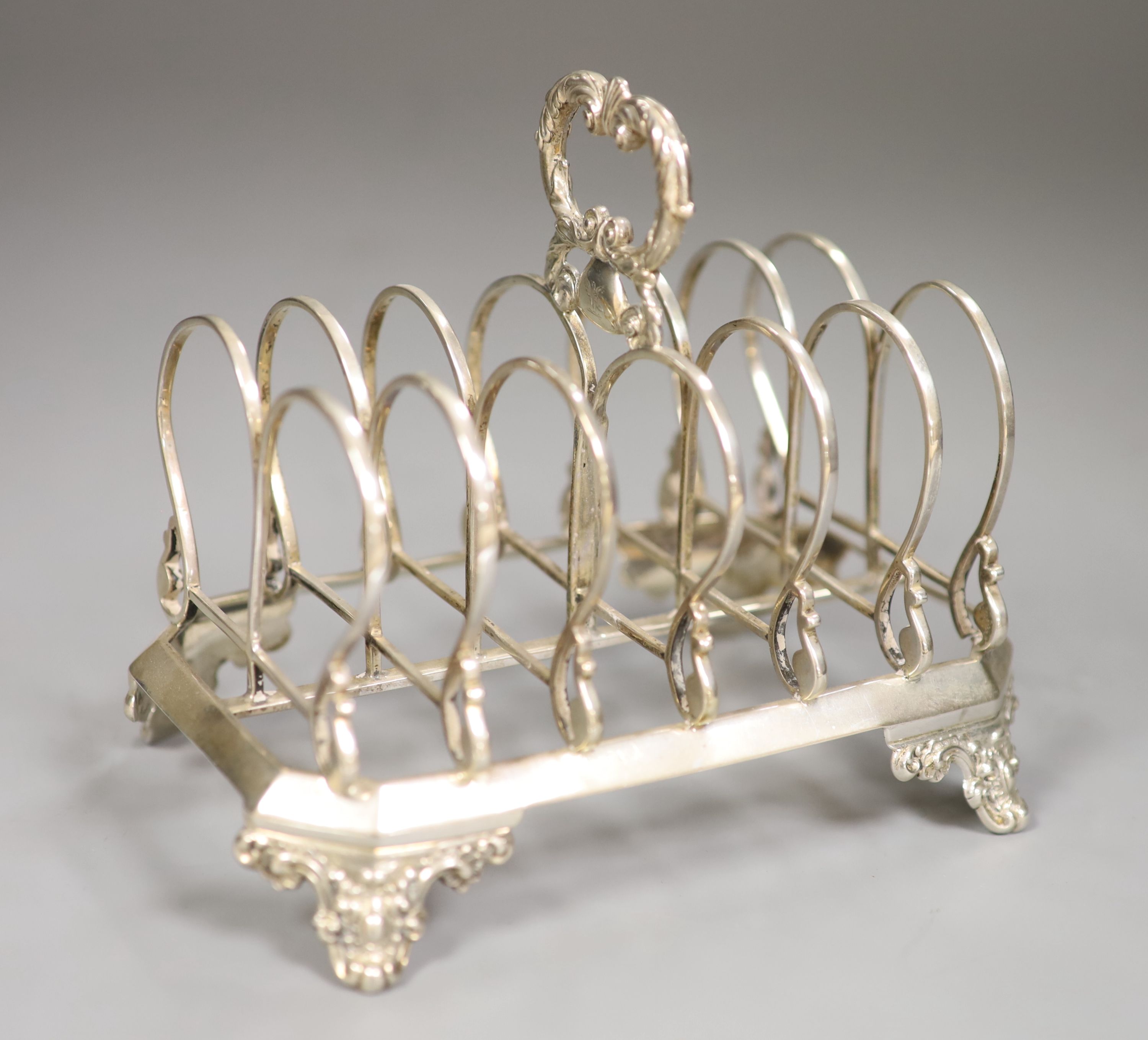 A Victorian silver six division toastrack, John Evans II, London 1843, height 13.2cm, 9oz.
